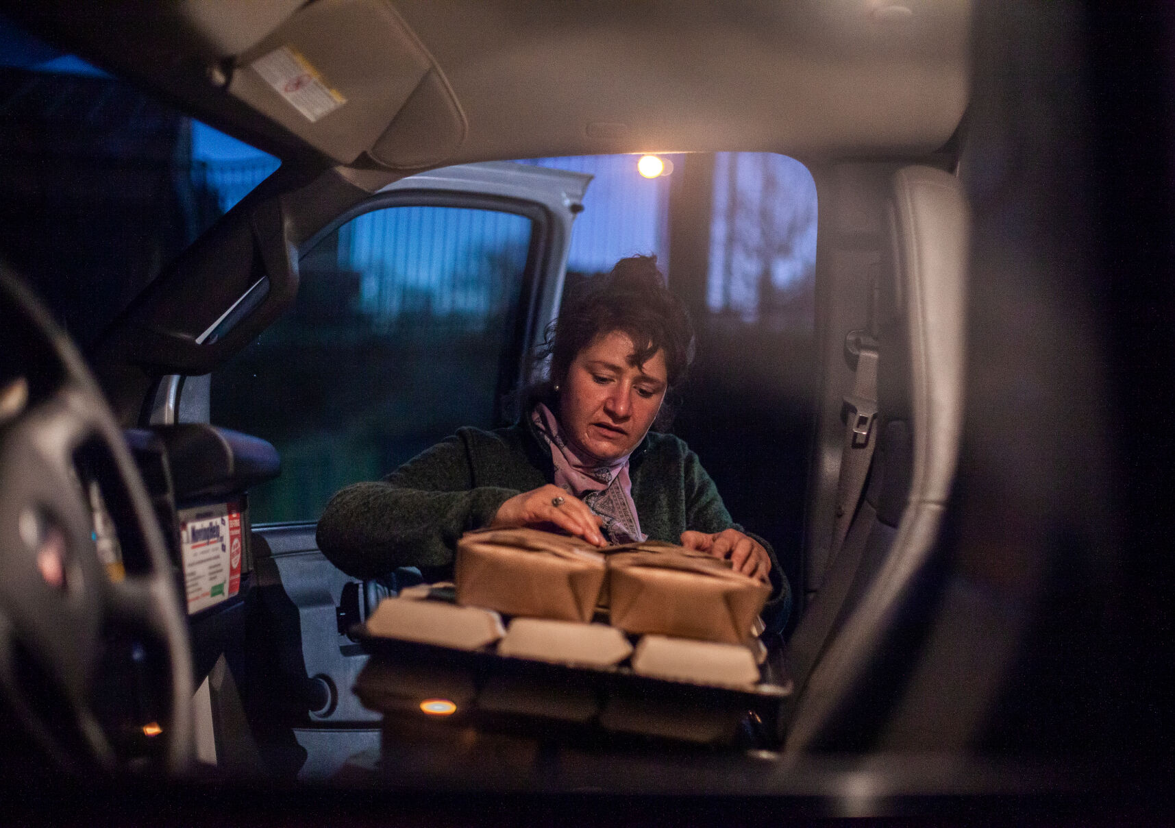 Michelle La Fata loads freshly made bucatini into the front seat of a U-Haul